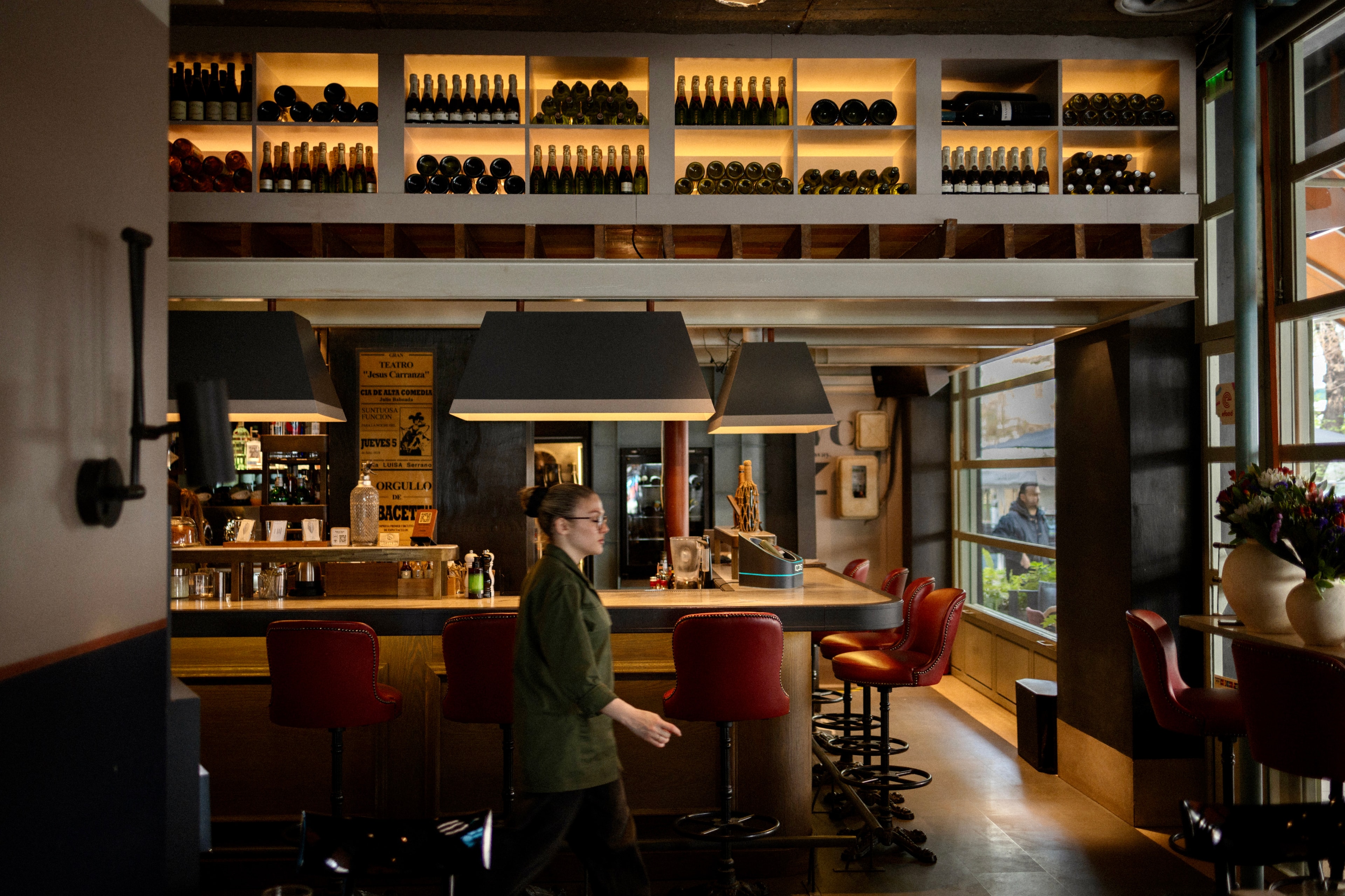 Canteen SKG’s evening vibe — industrial chic decor, warm lighting, gourmet dishes